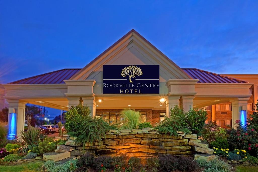 a hotel with a sign that reads rockville centre hotel at Rockville Centre Hotel - JFK Airport in Lynbrook