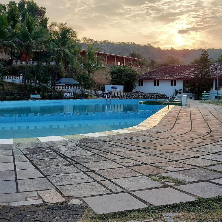 Bazén v ubytování Indismart Woodbourne Resort nebo v jeho okolí