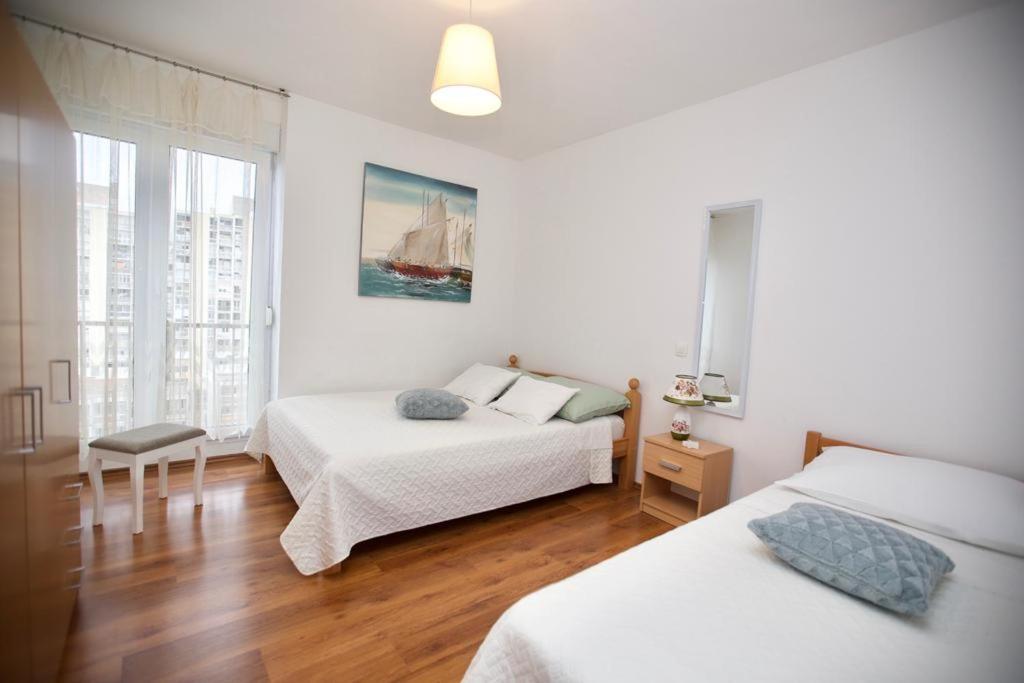 Posteľ alebo postele v izbe v ubytovaní Apartment Gaga Split