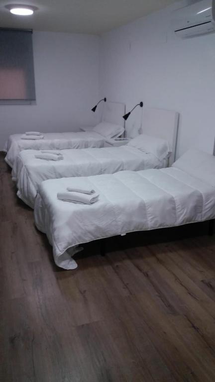 Postel nebo postele na pokoji v ubytování Europa House Village