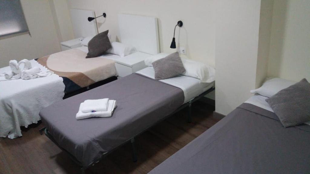 Postel nebo postele na pokoji v ubytování Europa House Village