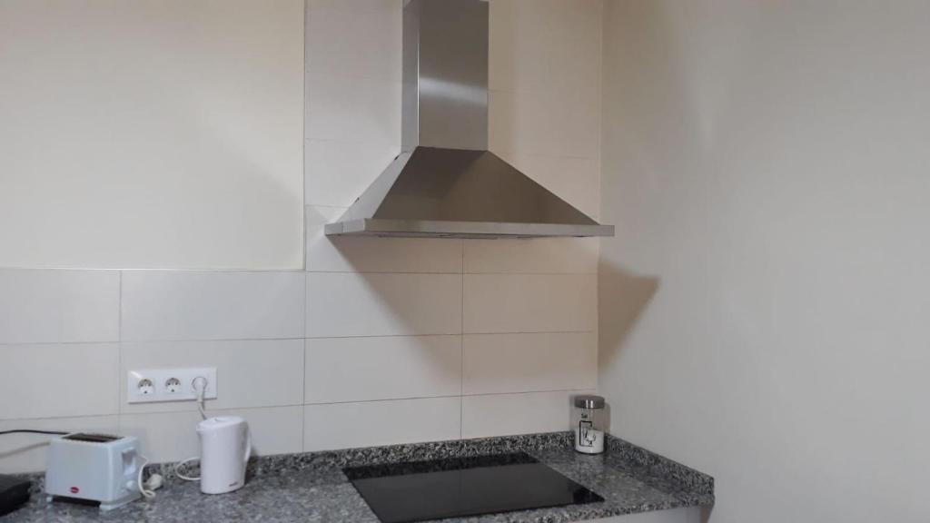 Kuchyň nebo kuchyňský kout v ubytování Europa House Village