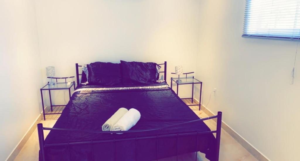 Postel nebo postele na pokoji v ubytování Apartment Curacao
