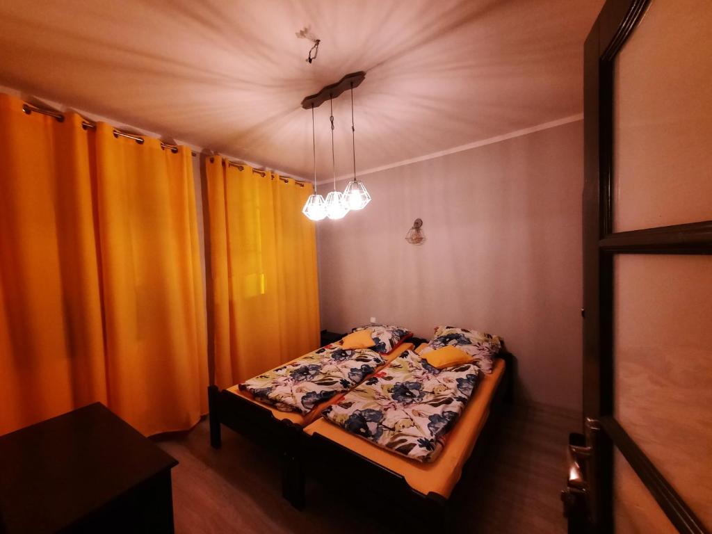Posteľ alebo postele v izbe v ubytovaní Na Starówce 2