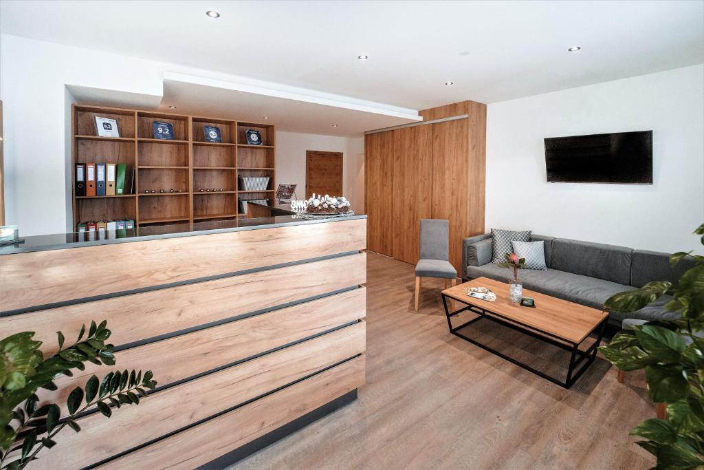 TV a/nebo společenská místnost v ubytování Sylpaulerhof Aparthotel
