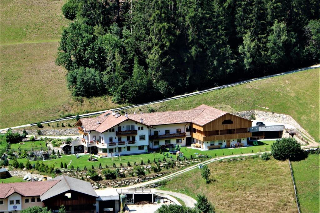 an aerial view of a resort with a building at Alpenappart in Cadipietra
