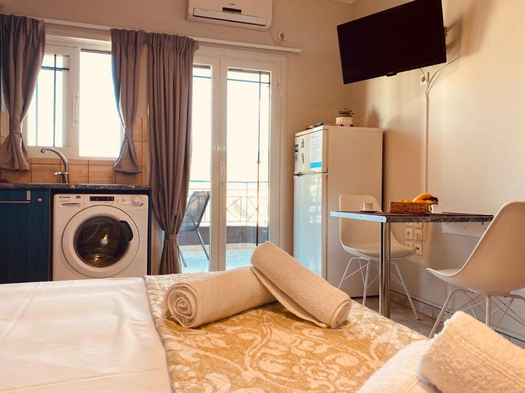 A bed or beds in a room at Colourful apartments (Violet sky)