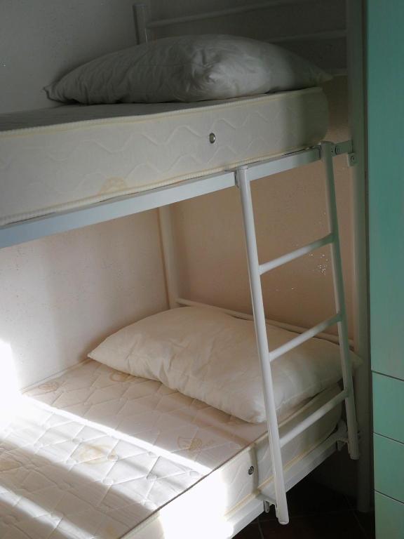 Postel nebo postele na pokoji v ubytování ALLOGGIO S.ANNA
