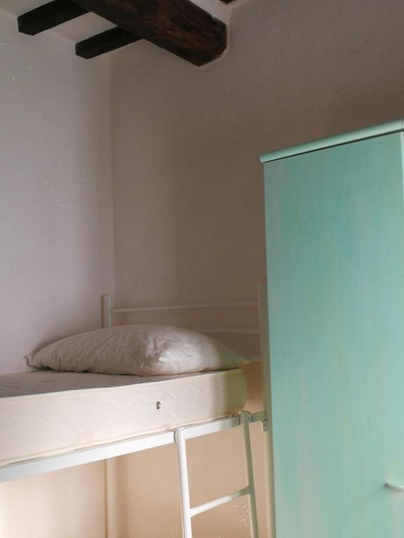 Palanda nebo palandy na pokoji v ubytování ALLOGGIO S.ANNA