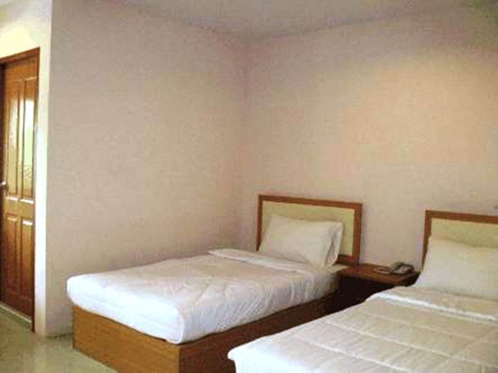 Postel nebo postele na pokoji v ubytování Cozy Villa