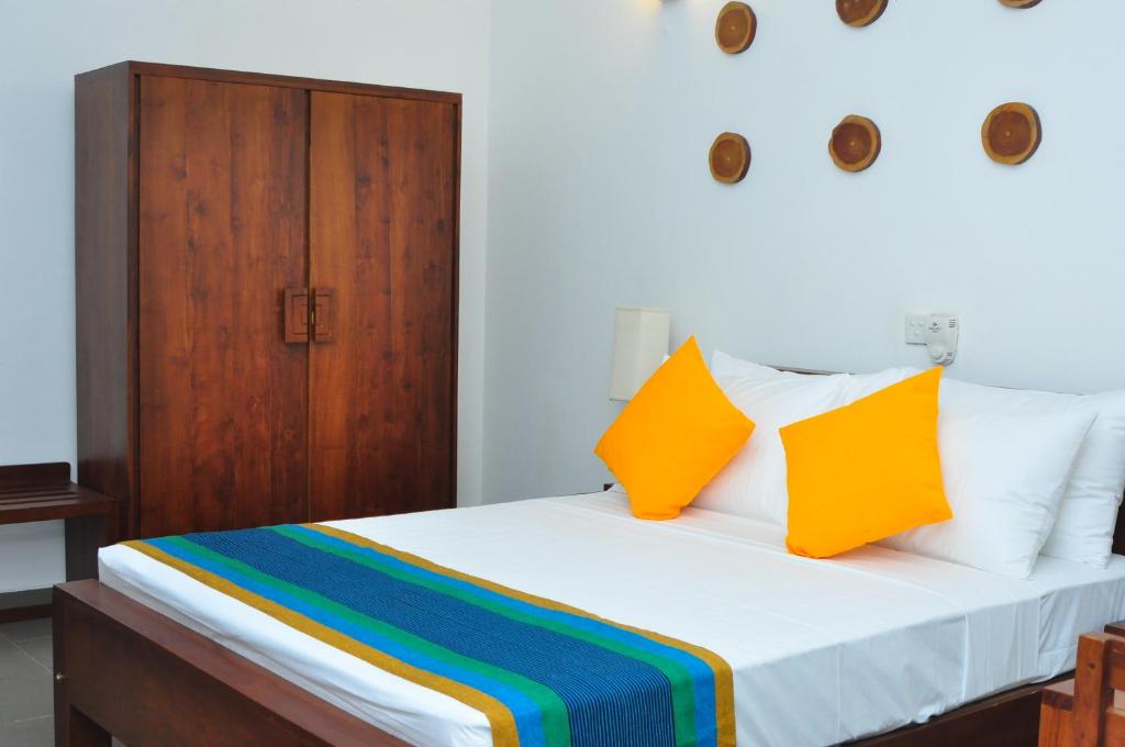 Postel nebo postele na pokoji v ubytování Comfort@15 Hotel Colombo