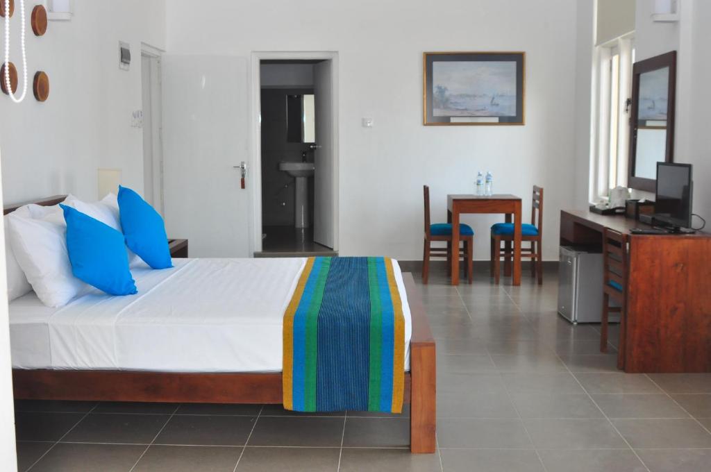 Postel nebo postele na pokoji v ubytování Comfort@15 Hotel Colombo