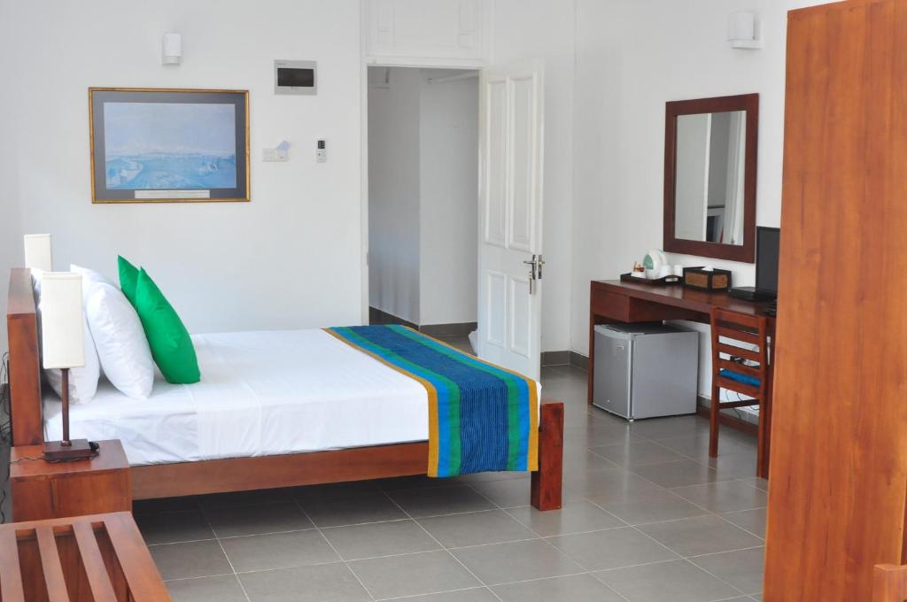 Postel nebo postele na pokoji v ubytování Comfort@15 Hotel Colombo
