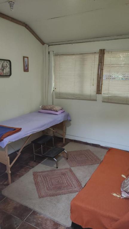 Postel nebo postele na pokoji v ubytování Cabañitas Remanso del Espíritu