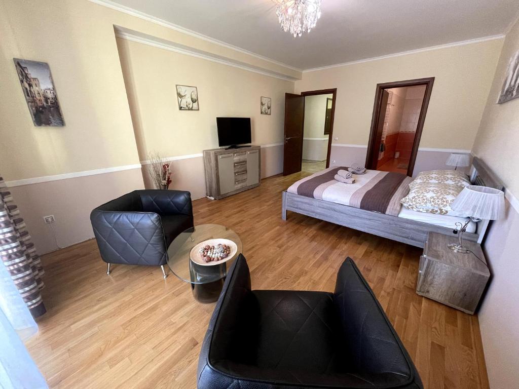 Postel nebo postele na pokoji v ubytování Apartment 122 Čertovka