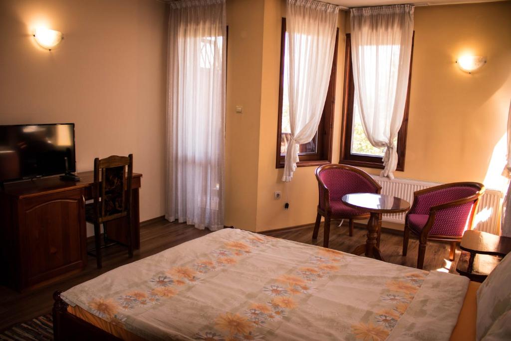 TV a/nebo společenská místnost v ubytování Guest House Ilinden