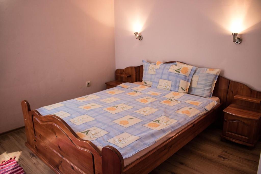 Postel nebo postele na pokoji v ubytování Guest House Ilinden