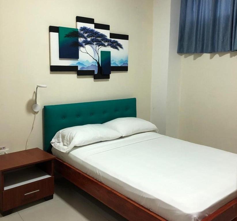 Postel nebo postele na pokoji v ubytování Hotel Andy