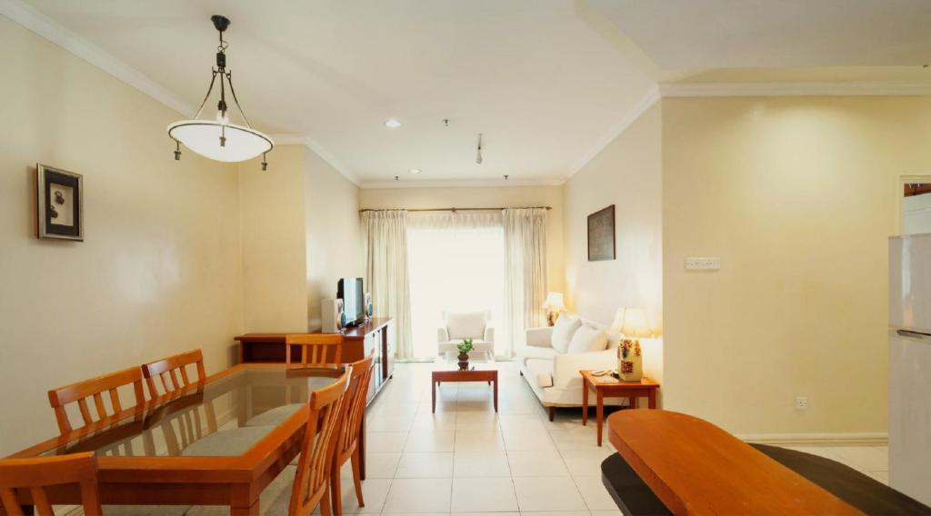 Χώρος καθιστικού στο StayInn Gateway Hotel Apartment