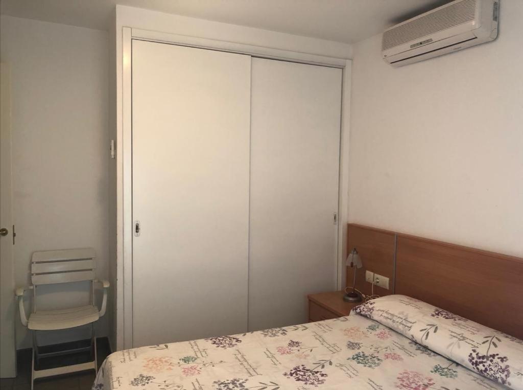 Posteľ alebo postele v izbe v ubytovaní Platja del Port