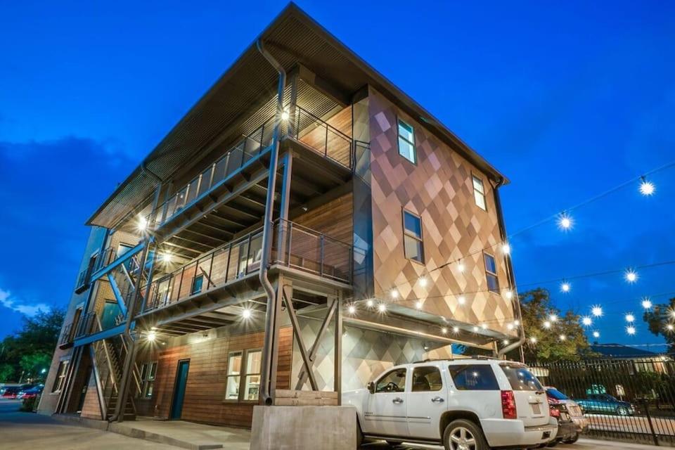 a house with a white car parked in front of it at Bishop Arts Hotel in Dallas