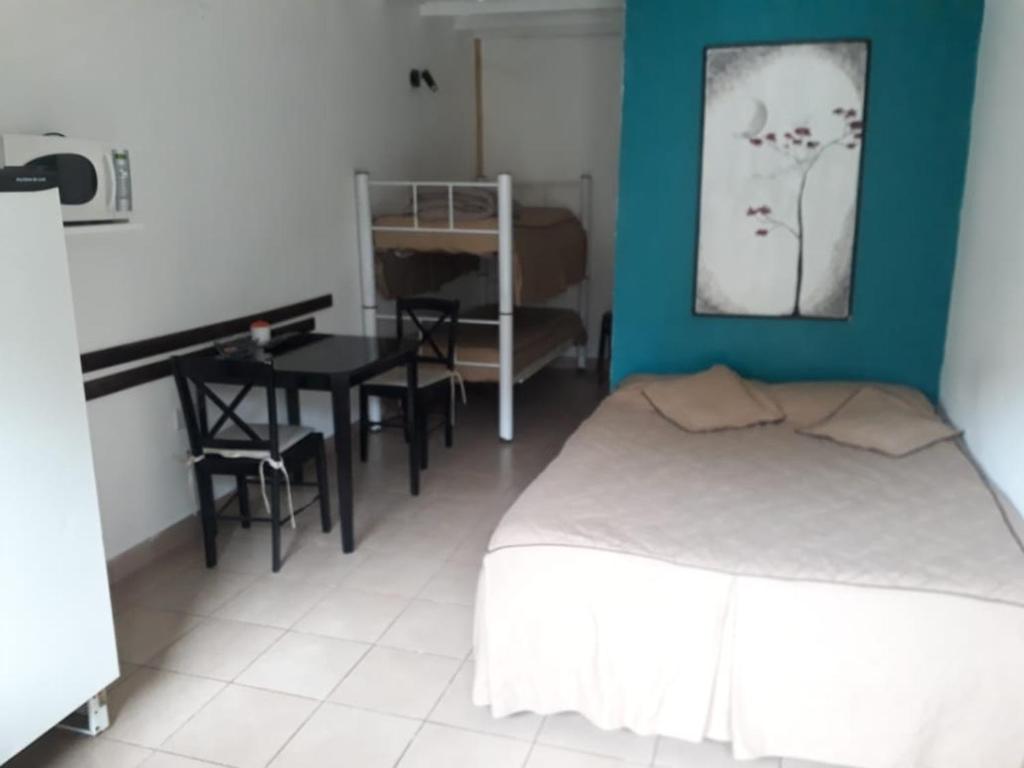Postel nebo postele na pokoji v ubytování Rada Tilly Apart Hotel