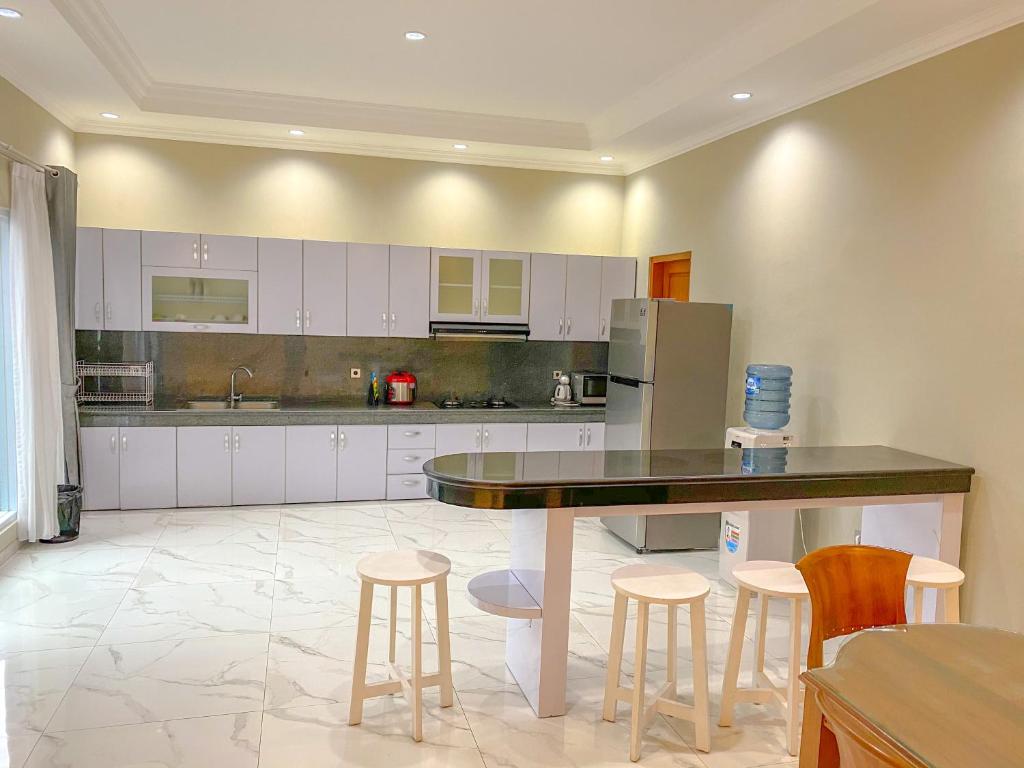 Kuchyň nebo kuchyňský kout v ubytování Al Andalus Resort Puncak