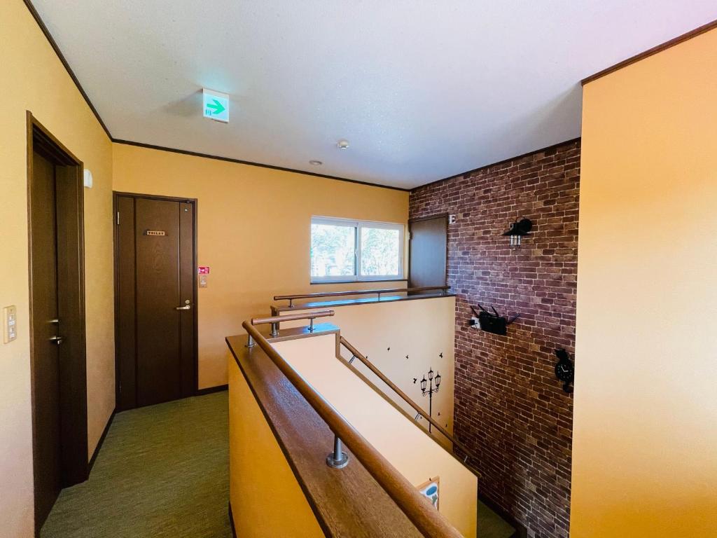 Kuchyň nebo kuchyňský kout v ubytování Guesthouse Murabito