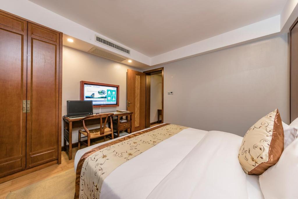 TV a/nebo společenská místnost v ubytování Fliport Garden Hotel Wuyishan