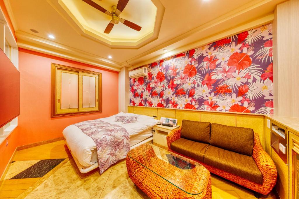 Postel nebo postele na pokoji v ubytování Hotel Atlantis Hawaiian Resorts(Adult only)