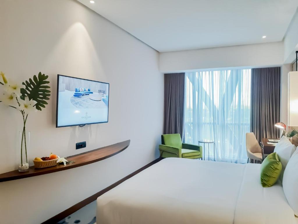 TV a/nebo společenská místnost v ubytování The Excelsior Hotel Las Piñas