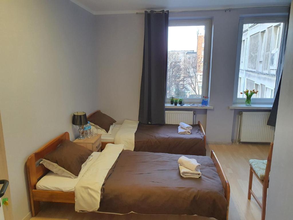 Posteľ alebo postele v izbe v ubytovaní Jasna Hotelik self check-in