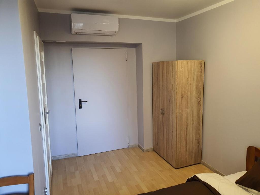 Posteľ alebo postele v izbe v ubytovaní Jasna Hotelik self check-in