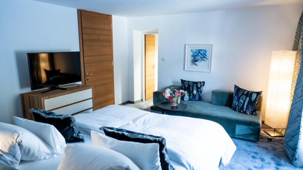 Postel nebo postele na pokoji v ubytování Hotel Christina