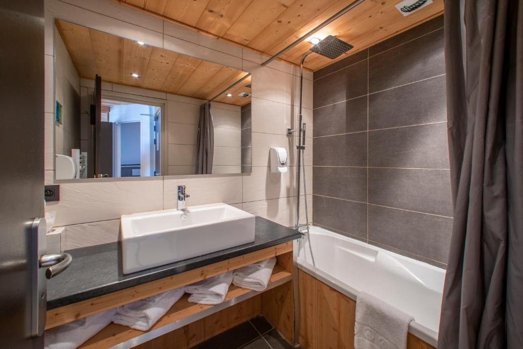 Koupelna v ubytování Chalet Les Rhodos