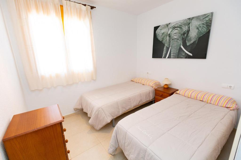 Postel nebo postele na pokoji v ubytování Ambar Beach Morpar Calp