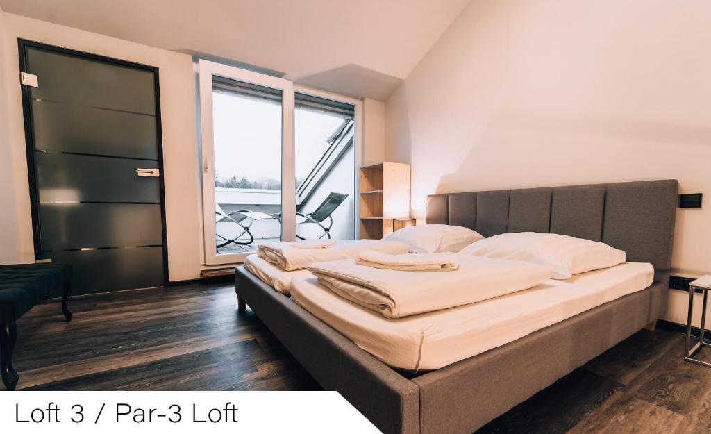 Postel nebo postele na pokoji v ubytování Events and Stay