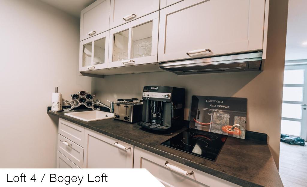 Kuchyň nebo kuchyňský kout v ubytování Events and Stay