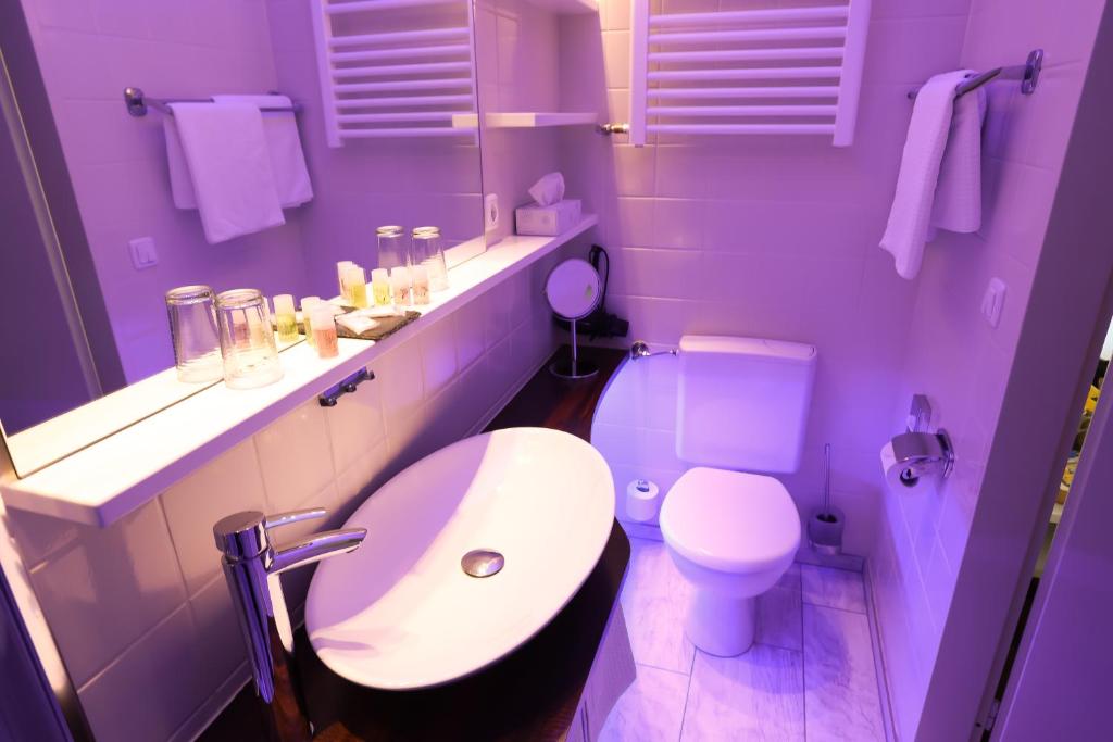 Koupelna v ubytování Hotel Modena