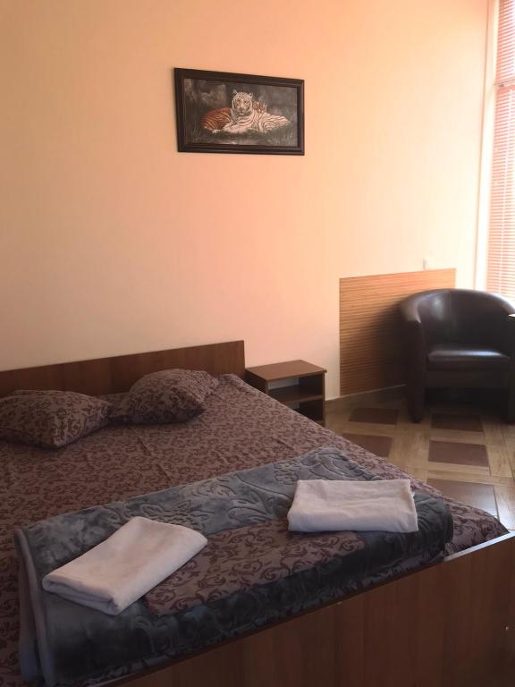 Postel nebo postele na pokoji v ubytování Мотель "Євро"