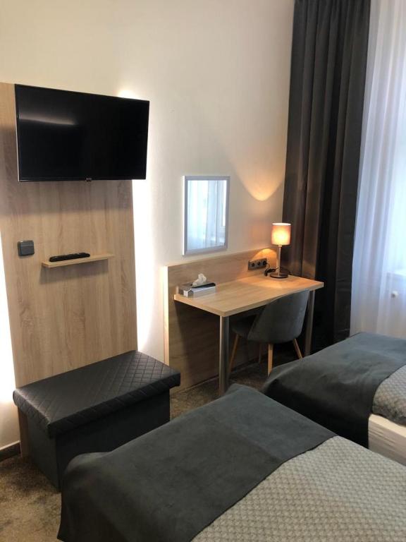 Postel nebo postele na pokoji v ubytování Penzion Ema B&B
