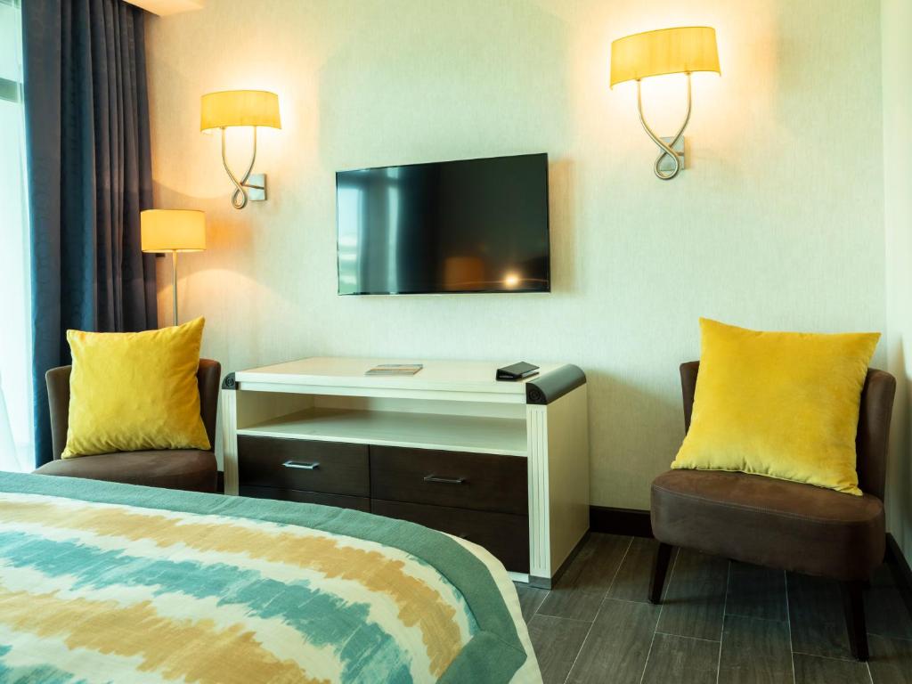 Postel nebo postele na pokoji v ubytování Retaj Salwa Resort & Spa