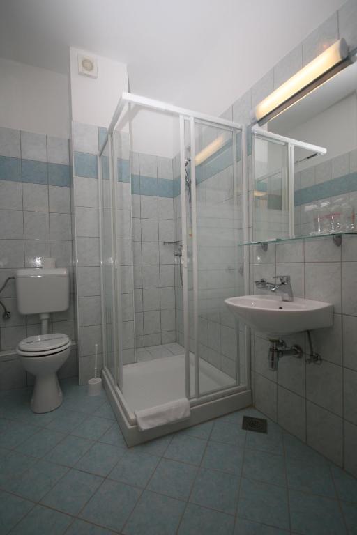 Koupelna v ubytování Hotel Porto