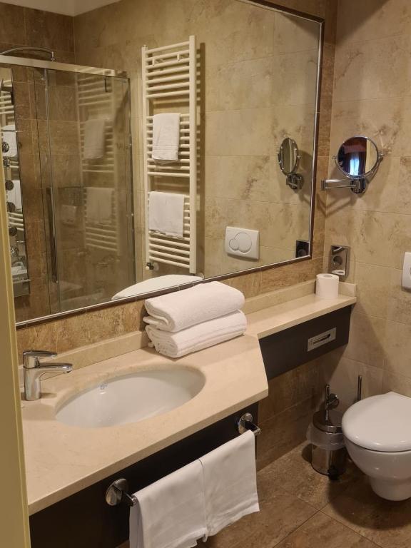 Elysium Hotel Raya - Comfort Triple Room