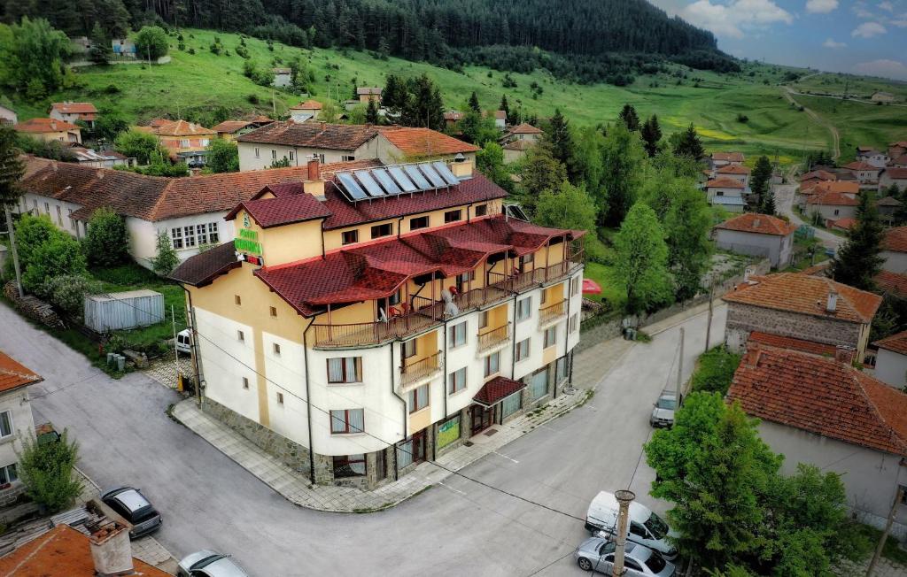 an aerial view of a village with a building at Boryka Family Hotel in Yasă-Koriya