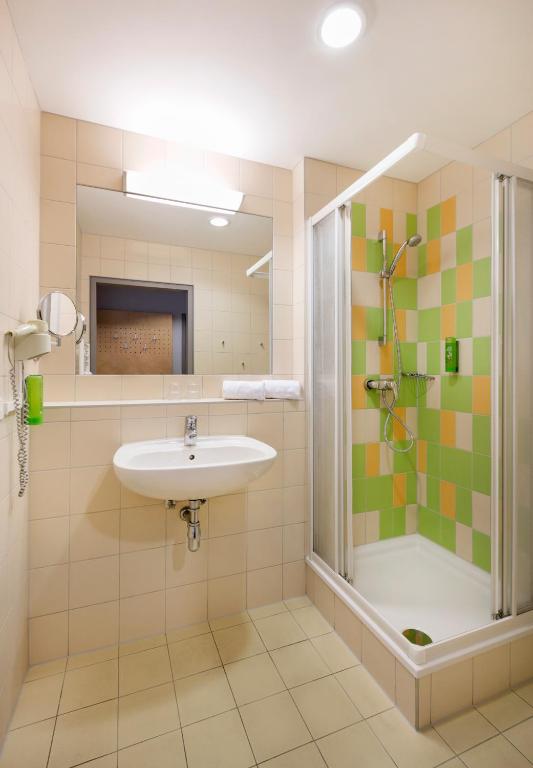 Koupelna v ubytování JUFA Hotel Waldviertel