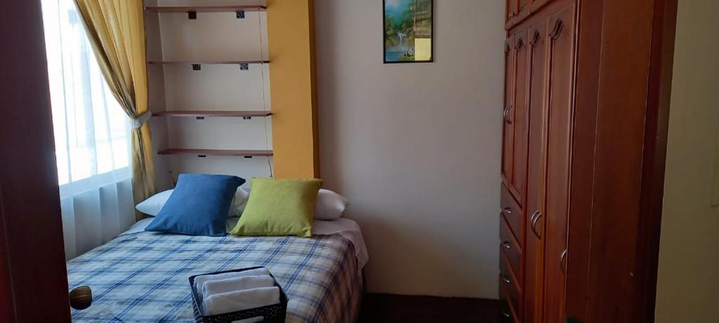 Postel nebo postele na pokoji v ubytování Dulce Hogar 02