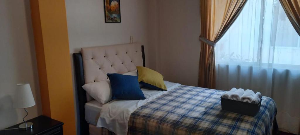 Postel nebo postele na pokoji v ubytování Dulce Hogar 02