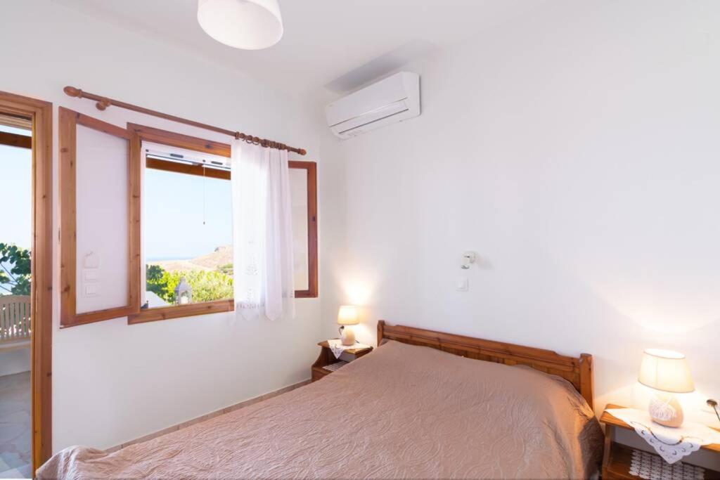 A bed or beds in a room at Hope's Studio