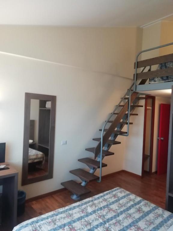 Postel nebo postele na pokoji v ubytování Hotel La Fonte